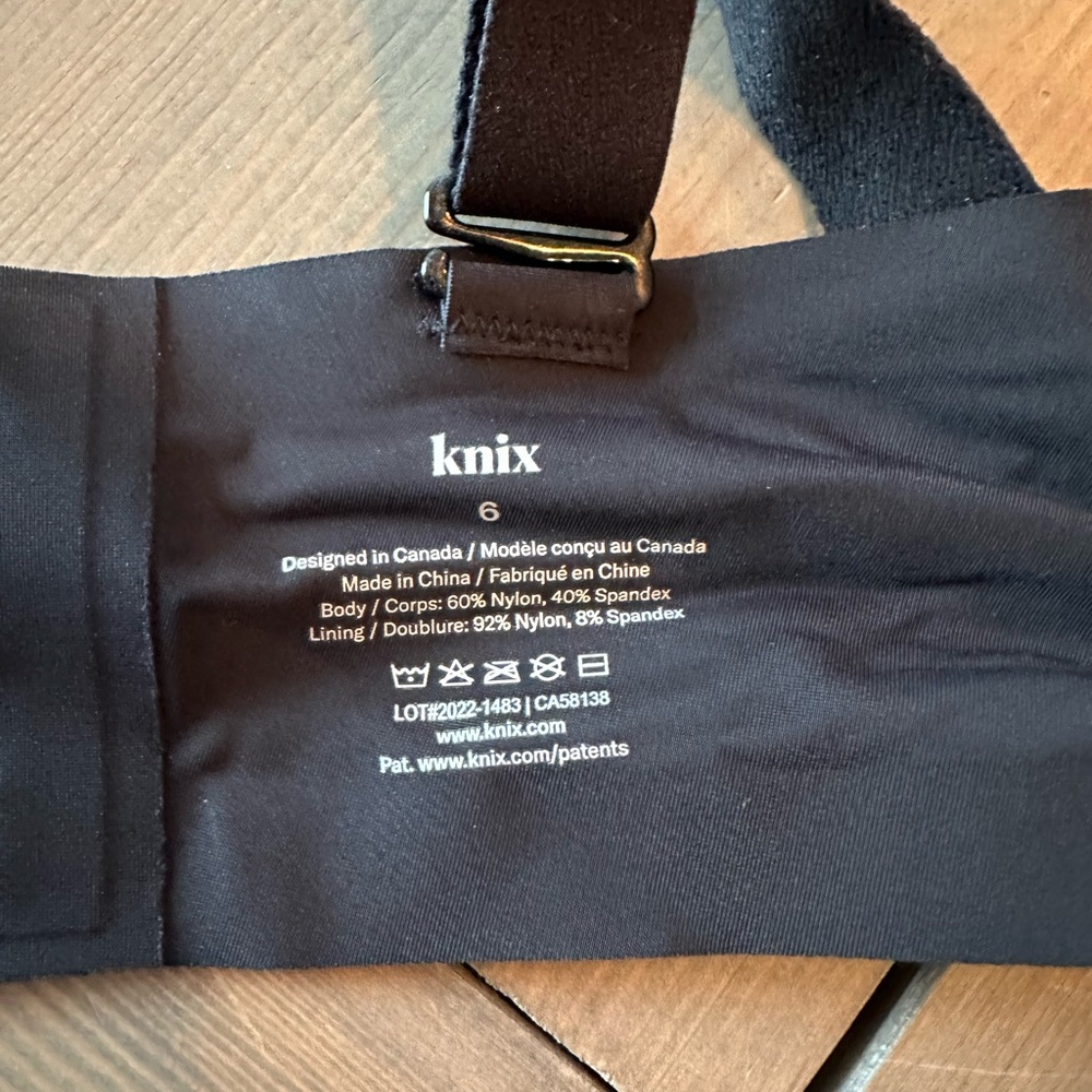 Knix v-neck bra.  Thin straps.  Size 6.  Black.  Never worn.